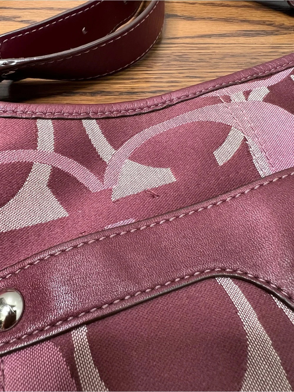 Coach Penelope Optic Signature Hippie Crossbody Bag in a purple/plum color